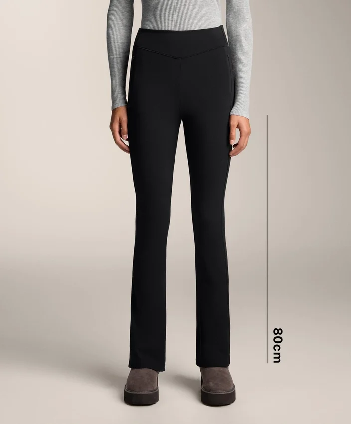 Pantalones acampanados de talle alto con bolsillos Pantalones acampanados de talle alto con bolsillos