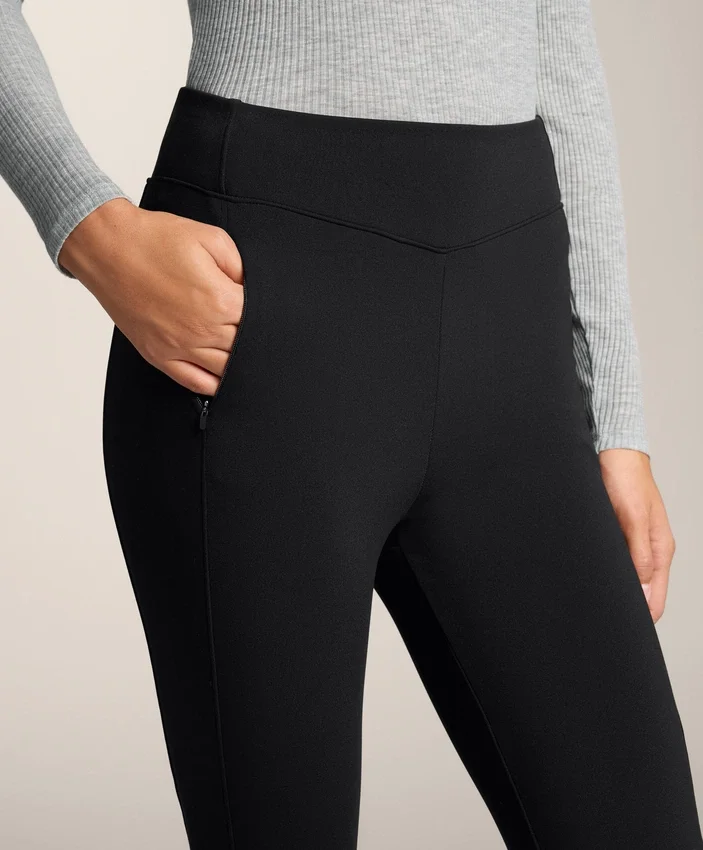 Pantalones acampanados de talle alto con bolsillos Pantalones acampanados de talle alto con bolsillos