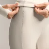 Pantalones acampanados de talle alto con bolsillos