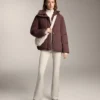 Pantalones acampanados de talle alto con bolsillos