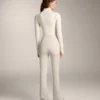 Pantalones acampanados de talle alto con bolsillos