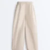 Pantalones ajustados con pliegues 100 % algodón Pantalones ajustados con pliegues 100 % algodón