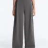 Pantalones de algodón piqué de tiro alto y pierna ancha Pantalones de algodón piqué de tiro alto y pierna ancha