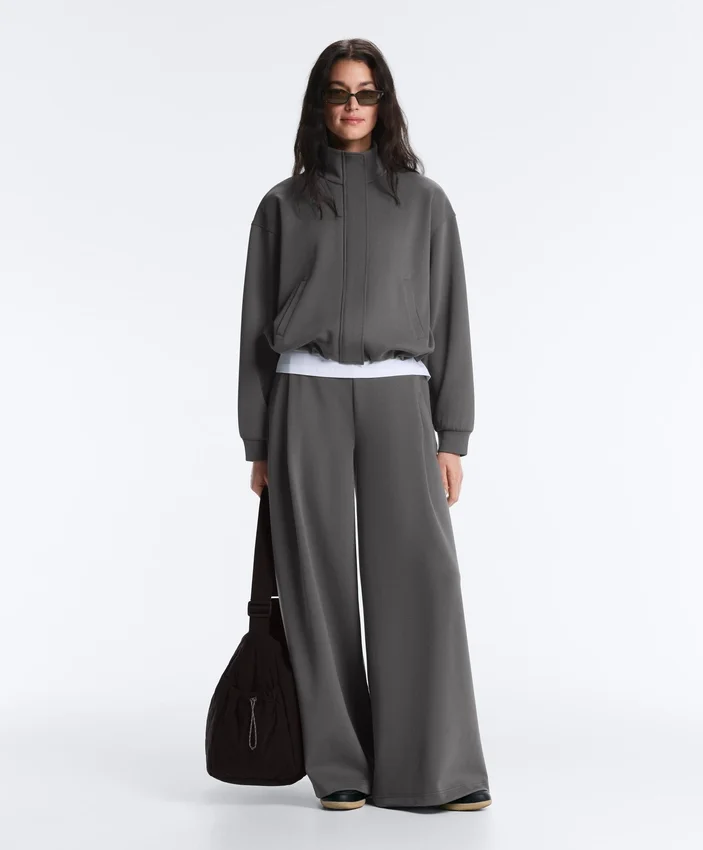 Pantalones de algodón piqué de tiro alto y pierna ancha Pantalones de algodón piqué de tiro alto y pierna ancha