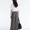 Pantalones de algodón piqué de tiro alto y pierna ancha Pantalones de algodón piqué de tiro alto y pierna ancha