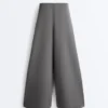 Pantalones de algodón piqué de tiro alto y pierna ancha Pantalones de algodón piqué de tiro alto y pierna ancha