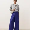 Pantalones de pierna ancha 100 % lino con pliegue lateral Pantalones de pierna ancha 100 % lino con pliegue lateral