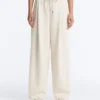 Pantalones de pierna ancha con pliegues de piqué y algodón Pantalones de pierna ancha con pliegues de piqué y algodón