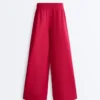 Pantalones de pierna ancha con pliegues de piqué y algodón Pantalones de pierna ancha con pliegues de piqué y algodón