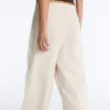 Pantalones de pierna ancha con pliegues de piqué y algodón Pantalones de pierna ancha con pliegues de piqué y algodón