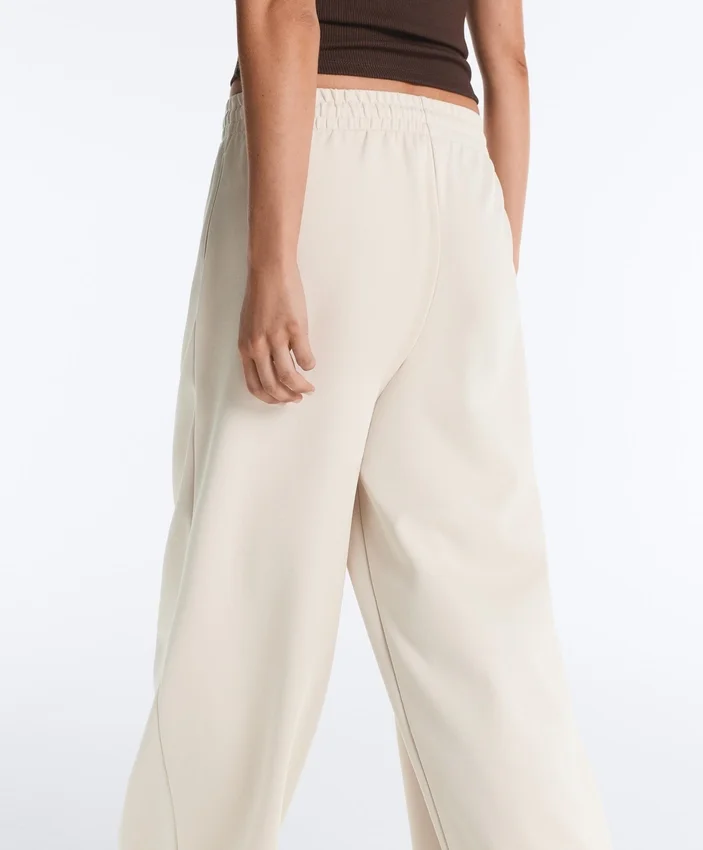 Pantalones de pierna ancha con pliegues de piqué y algodón Pantalones de pierna ancha con pliegues de piqué y algodón