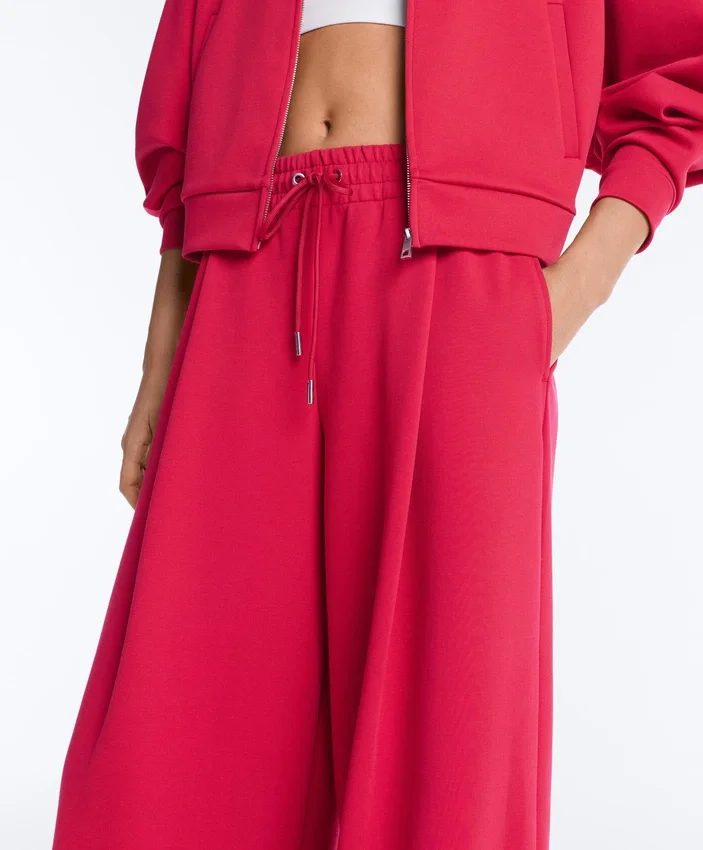 Pantalones de pierna ancha con pliegues de piqué y algodón Pantalones de pierna ancha con pliegues de piqué y algodón
