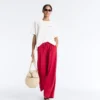 Pantalones de pierna ancha con pliegues de piqué y algodón Pantalones de pierna ancha con pliegues de piqué y algodón