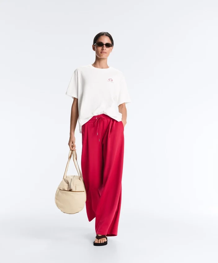 Pantalones de pierna ancha con pliegues de piqué y algodón Pantalones de pierna ancha con pliegues de piqué y algodón