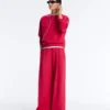 Pantalones de pierna ancha con pliegues de piqué y algodón Pantalones de pierna ancha con pliegues de piqué y algodón