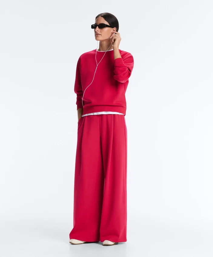Pantalones de pierna ancha con pliegues de piqué y algodón Pantalones de pierna ancha con pliegues de piqué y algodón