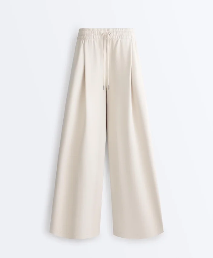 Pantalones de pierna ancha con pliegues de piqué y algodón Pantalones de pierna ancha con pliegues de piqué y algodón