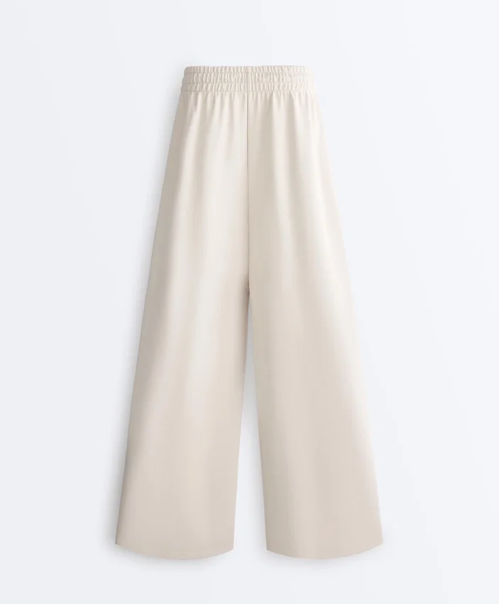 Pantalones de pierna ancha con pliegues de piqué y algodón Pantalones de pierna ancha con pliegues de piqué y algodón