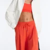 Pantalones de pierna ancha de algodón piqué con pliegues
