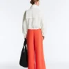 Pantalones de pierna ancha de algodón piqué con pliegues