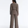 Chaqueta larga con rayas asimétricas y modal