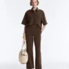 Pantalones de piqué ajustados de talle bajo con algodón Pantalones de piqué ajustados de talle bajo con algodón