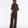 Pantalones de piqué ajustados de talle bajo con algodón Pantalones de piqué ajustados de talle bajo con algodón