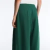 Pantalones de piqué de algodón de pierna ancha con pliegues Pantalones de piqué de algodón de pierna ancha con pliegues