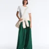Pantalones de piqué de algodón de pierna ancha con pliegues Pantalones de piqué de algodón de pierna ancha con pliegues