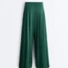 Pantalones de piqué de algodón de pierna ancha con pliegues Pantalones de piqué de algodón de pierna ancha con pliegues