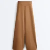 Pantalones de talle alto y pierna ancha con efecto neopreno Pantalones de talle alto y pierna ancha con efecto neopreno