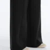 Pantalones de talle alto y pierna ancha con efecto neopreno Pantalones de talle alto y pierna ancha con efecto neopreno