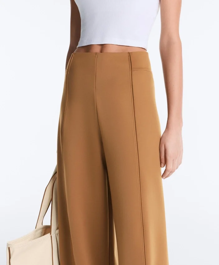Pantalones de talle alto y pierna ancha con efecto neopreno Pantalones de talle alto y pierna ancha con efecto neopreno