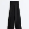 Pantalones de talle alto y pierna ancha con efecto neopreno Pantalones de talle alto y pierna ancha con efecto neopreno