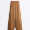 Pantalones de talle alto y pierna ancha con efecto neopreno Pantalones de talle alto y pierna ancha con efecto neopreno