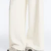 Pantalones de tiro alto de sarga y pierna ancha con pliegues Pantalones de tiro alto de sarga y pierna ancha con pliegues