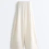 Pantalones de tiro alto de sarga y pierna ancha con pliegues Pantalones de tiro alto de sarga y pierna ancha con pliegues