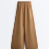Pantalones de tiro alto de sarga y pierna ancha con pliegues Pantalones de tiro alto de sarga y pierna ancha con pliegues
