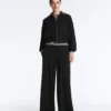 Pantalones largos de pierna ancha con modal Soft Touch y pliegues