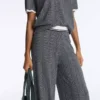 Pantalones rectos de punto con diseño en espiga Pantalones rectos de punto con diseño en espiga
