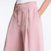 Pantalones rectos plisados de piqué de algodón
