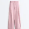Pantalones rectos plisados de piqué de algodón