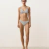 Partes de arriba de bikini halter de jacquard con lunares Partes de arriba de bikini halter de jacquard con lunares