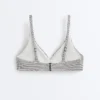 Partes de arriba de bikini halter de jacquard con lunares Partes de arriba de bikini halter de jacquard con lunares