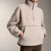 Sudadera de imitación de chaquetas de piel de oveja con bolsillo delantero