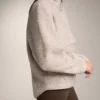 Sudadera de imitación de chaquetas de piel de oveja con bolsillo delantero