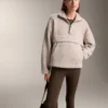 Sudadera de imitación de chaquetas de piel de oveja con bolsillo delantero